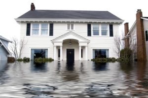 Image of a house surrounded by rising water
