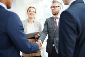 Business people shaking hands