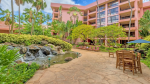 Photo of waterfall and patio area of Hawaiian condo building