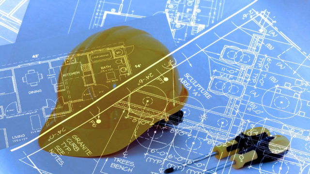 image of blueprints, helmet and screwdrivers