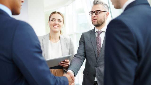 Business people shaking hands