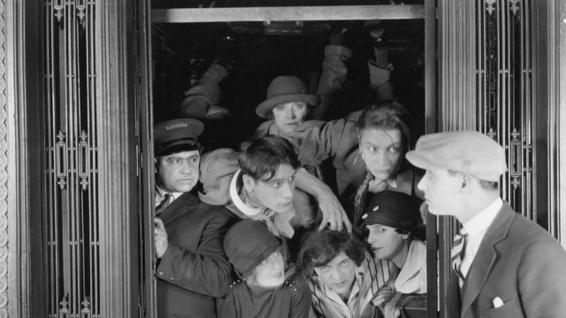 Old-fashioned elevator overcrowded