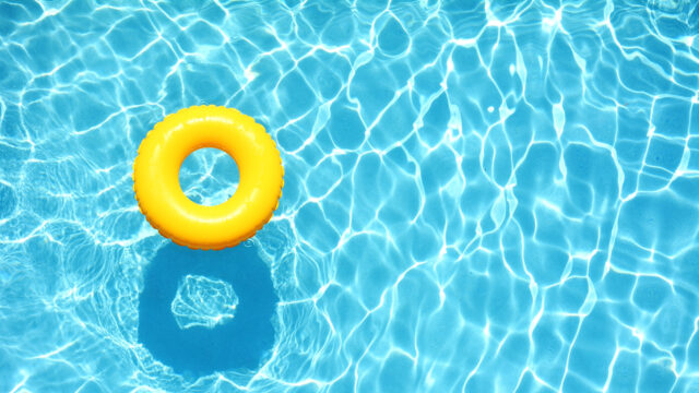 Pool water with yellow life saver