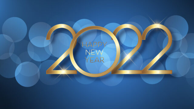 Happy New Year 2022 in gold over a blue background