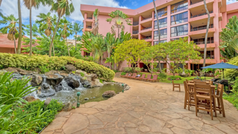 Photo of waterfall and patio area of Hawaiian condo building